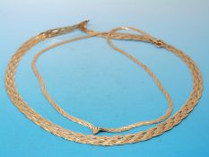 A 9ct gold ribbon necklace and a 9ct gold tricolour ribbon necklace (10.