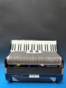 A c1980s Hohner Carena IIIM 120 bass piano accordion, in black finish (overhauled by Ivor Hyde,
