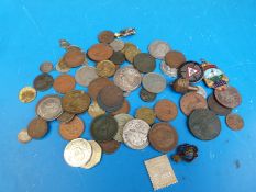 A small quantity of interesting coins, small silver content, badges etc,