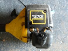 A petrol hover mower and two petrol strimmers