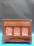 A late 19thC hand turned barrel organ playing 12 tunes on a 22 note key frame and playing on organ