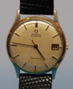 A 9ct gold Omega automatic gentleman's wristwatch with date aperture original leather strap and