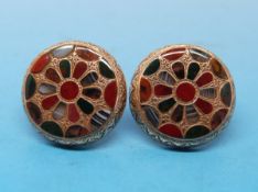 A pair of yellow metal Victorian earrings set with sections of agate in a flower design