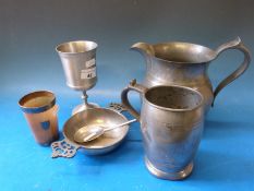 A hallmarked silver mounted horn cup together with a collection of pewter
