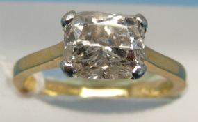 An 18ct gold ring set with a cushion cut solitaire diamond measuring approx 2ct (size J)