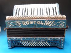 A c1930s 'Frontalini' 48 bass piano accordion in blue finish with mauve trim and diamanté