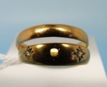 A hallmarked 22ct gold wedding band (2.7g) together with an 18ct gold ring (size M, 2.
