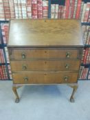 A late 19th/early 20th century student's bureau, width 61cm,