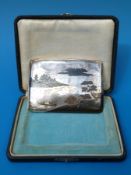 A white metal and Niello ware cased cigarette case with Japanese scene to front,
