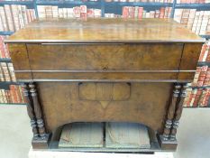 A c19th walnut cased reed organ/harmonium with foot pedal operated bellows (width 126cm)