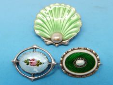 A Charles Horner silver brooch decorated with blue enamel and a pink flower to the centre,