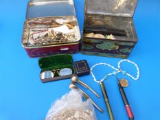 A collection of costume jewellery to include faux pearls, brooches,