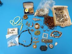 A collection of costume jewellery to include silver rings,