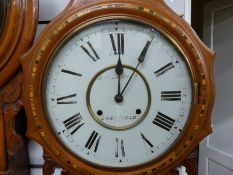 An inlaid 19thC drop dial two train wall clock marked J.G.