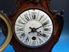 A French Louis IV style lacquer clock with gilt metal mounts indistinctly signed to dial Paris and