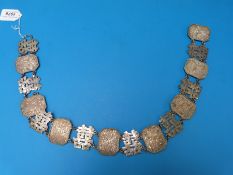 A Chinese silver belt with bamboo and auspicious symbol links,