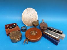 A quantity of collectables to include hallmarked silver napkin ring, Hohner mouth organs,