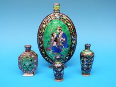 An Indian white metal flask decorated with blue and green guilloché enamel depicting a couple,