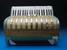 A 120 bass 1950s Hohner Machesa piano accordion in light green finish,