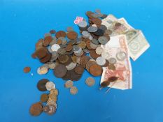 A collection of world coinage 19thC onwards, including some silver, Nazi example bank notes,