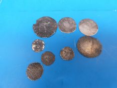 Eight Elizabeth I hammered coins comprising shillings, two sixpences, a half groat,