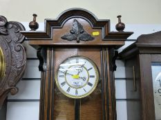 A weight driven timepiece, Vienna regulator c1880 in walnut case with ebonised decoration,