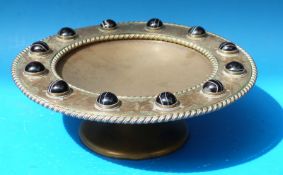 A brass tazza set with 12 agate cabochon,