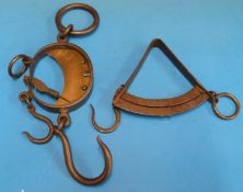 An H Harron sector spring balance together with a dual scale steel and brass oval shaped spring