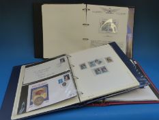 Two albums relating to aviation heritage and the Royal Family and one other album