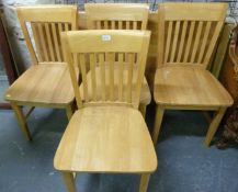 A beech table and four chairs (length 136 x width 86cm)