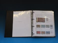 An album of 1937 Coronation mint stamps