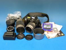 Nikon DSLR D50 together with 28 - 80mm and 70 - 300mm lenses and accessories