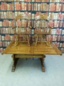 A pine kitchen table with two additional leaves and six matching chairs (L158 with added leaves