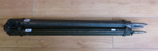 A brass mounted surveyor's or military tripod