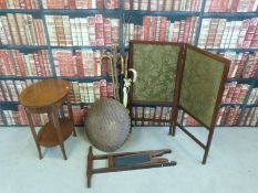 A two fold embroidered mahogany fire screen together with an oval side table with single drawer,