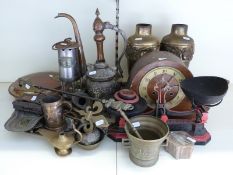 A collection of brass and metal items to include vases, lamps,