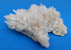 A geological sample formed of snow/grey coloured crystals,
