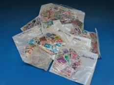 A quantity of world stamps in packets