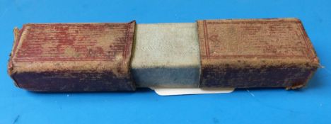 A cased brass rocker style sovereign scale