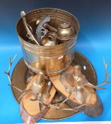 A large quantity of brass and copper ware to include an oriental style charger decorated with