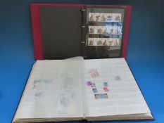 Two stockbooks of mint GB stamps including gutter pairs and traffic lights and some Georgian stamps