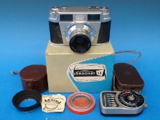 A Lordomat S E Rangefinder camera in box with instructions together with a Weston light meter and