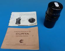 A Curta Type 1 mechanical calculator,