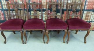 Four carved dining chairs