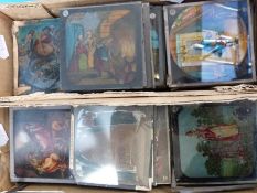 A collection of coloured magic lantern slides depicting children's stories, biblical scenes etc,