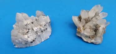 Two small geological samples, both formed of grey coloured crystals, one scattered with fools gold,