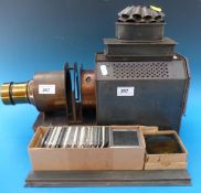 A Victorian magic lantern with later electric lighting,