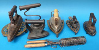 A quantity of vintage irons, trivets etc including a Silvester's patent round bottomed iron,