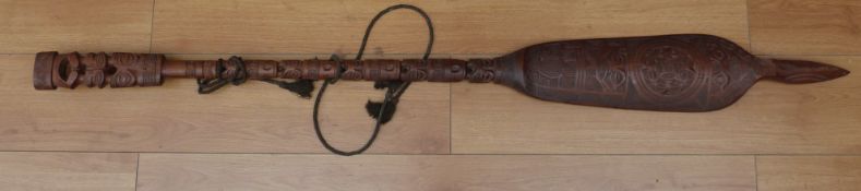 An African hardwood carved paddle,