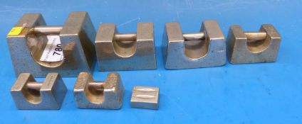 Seven brass bar weights including examples marked Young, Son & Marlow,